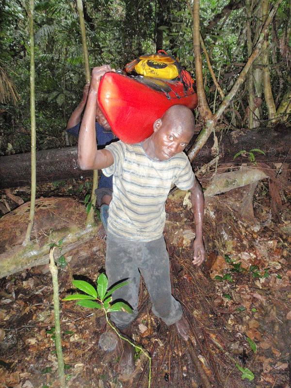 P33 Carrying the kayak trough the jungle near Kole to avoid the rapids.jpg